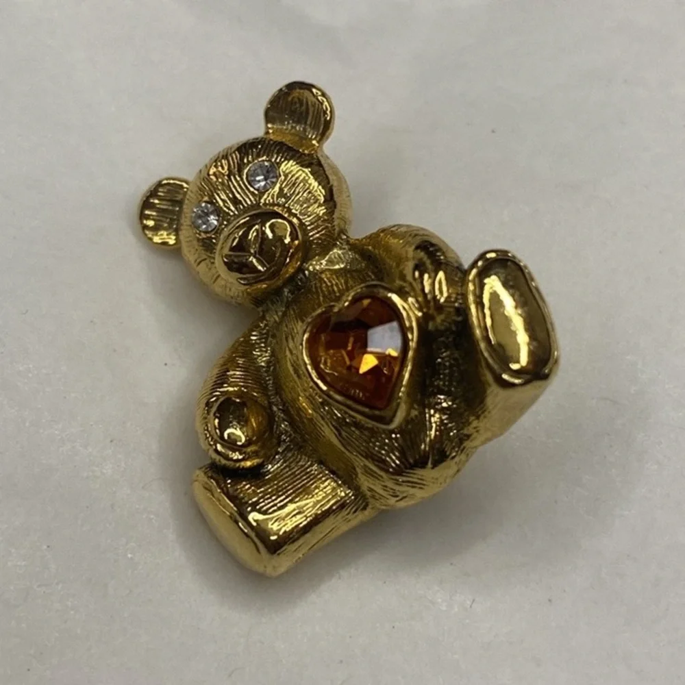 1928 Gold-Tone Teddy Bear Brooch with Amber Heart Crystal